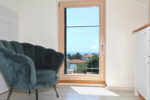 Apartment, 1 Schlafzimmer (2) | Wohnbereich | Flachbildfernseher