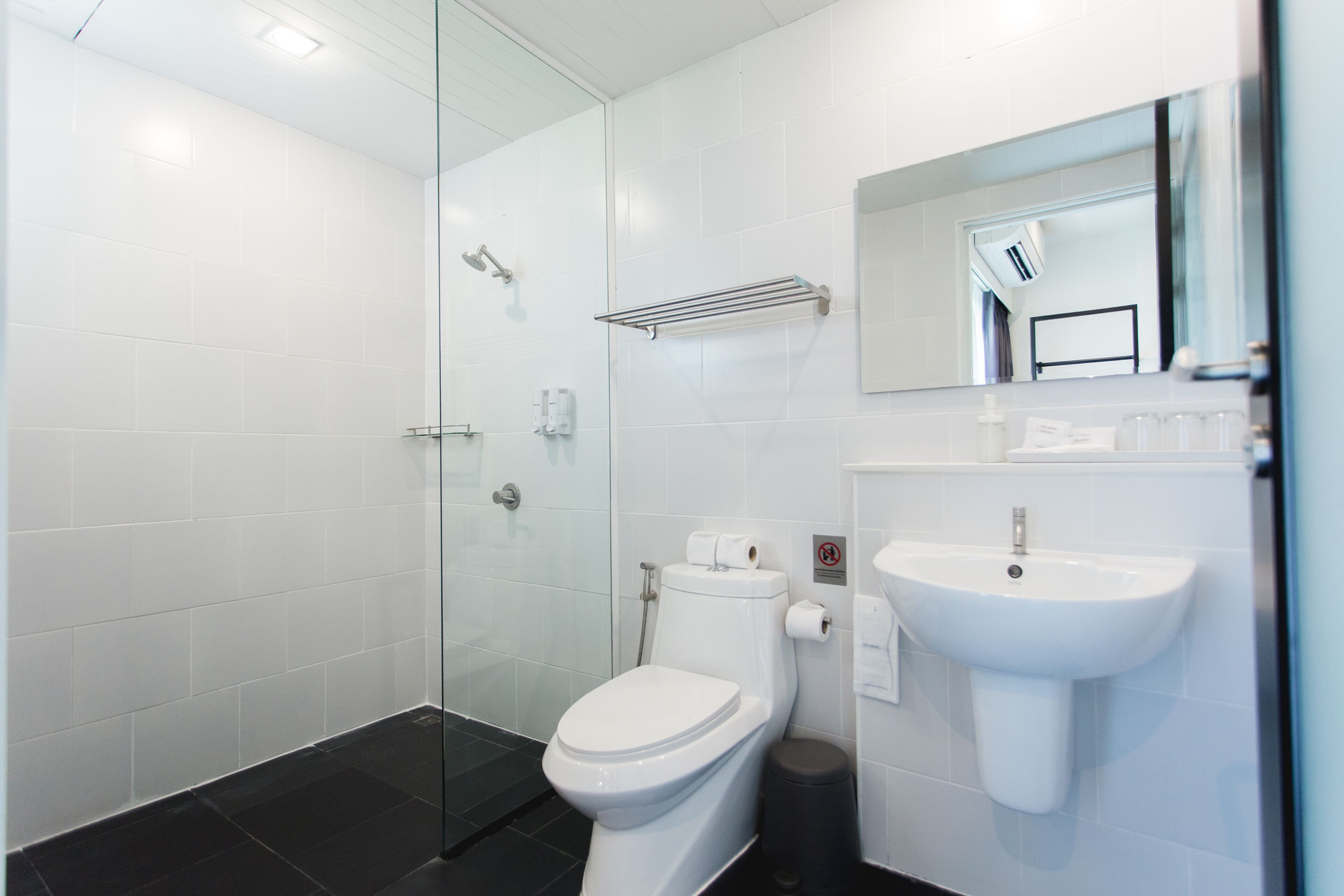 standard king room with sofa bed | bathroom | shower, free toiletries, hair dryer, slippers