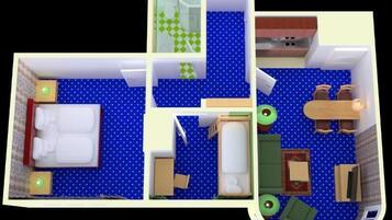 A hotel room with a bed, a desk, a chair, a small table, and a bathroom with a shower and toilet.