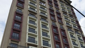 A tall building with multiple balconies and windows. - Sherry Homes Fahari II (Nairobi)