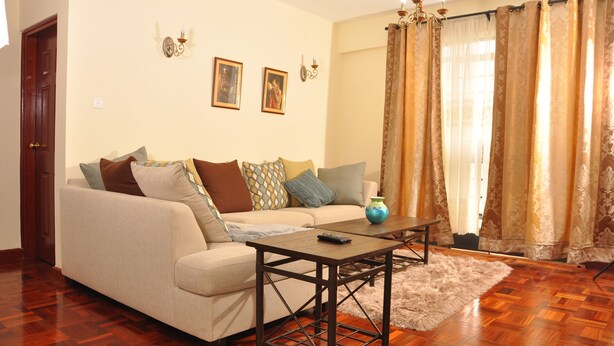 Comfort Apartment, 1 Queen Bed, Non Smoking | Living room | 40-inch TV with satellite channels, Netflix, streaming services - Sherry Homes Fahari II (Nairobi)