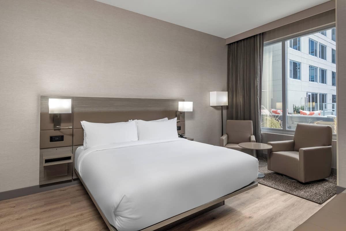Premium bedding, down comforters, in-room safe, desk