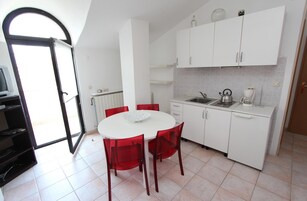 Apartment, 2 Bedrooms, Balcony | Private kitchen | Fridge, stovetop, coffee/tea maker, electric kettle