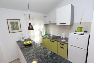 Lägenhet - 1 sovrum | Eget kök | Kylskåp, spishäll, kaffe- och tebryggare och vattenkokare