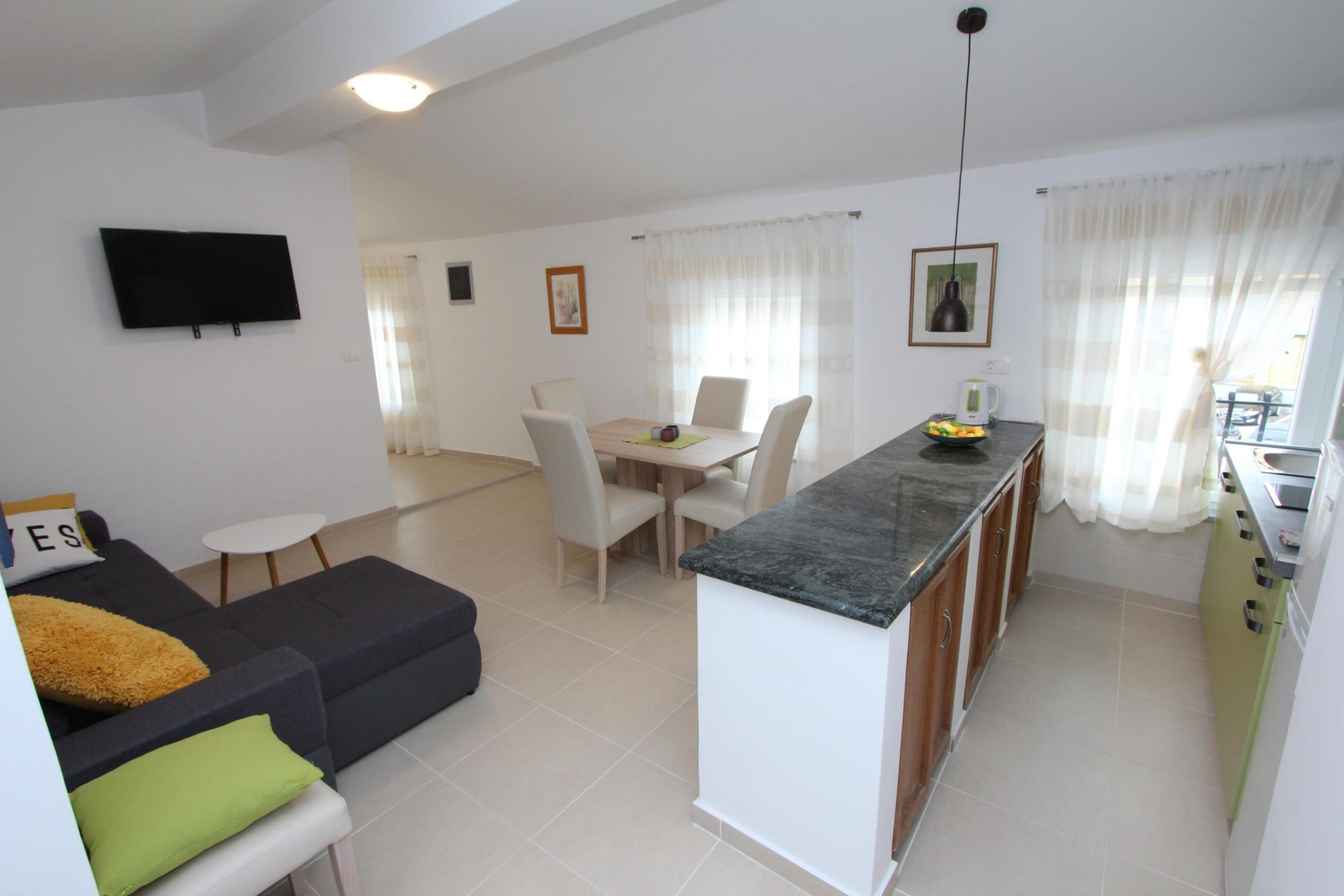 Apartment, 1 Bedroom | Living area | Flat-screen TV