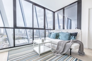 Deluxe Apartment, 1 Bedroom | Living area | LED TV