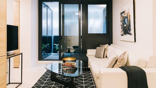 Living room - Stylish Melbourne Pad with Pool, Gym & Parking (Melbourne)