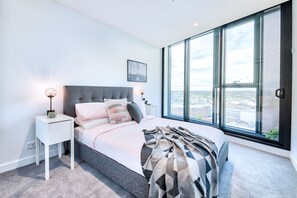 Deluxe Apartment, 1 Bedroom | 1 bedroom, in-room safe, iron/ironing board, free WiFi