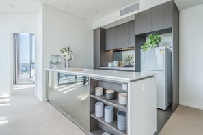 Deluxe Apartment, 2 Bedrooms | Private kitchen | Fridge, microwave, oven, stovetop
