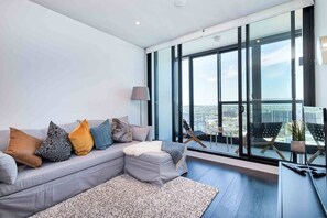 Deluxe Apartment, 1 Bedroom | Living room | LED TV