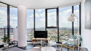 Apartamento Deluxe, 2 habitaciones | Zona de estar