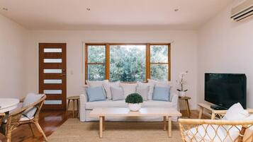 Deluxe House, 3 Bedrooms | Living area | LED TV, fireplace