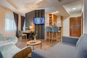 Suite Deluxe, 1 chambre | Coin séjour