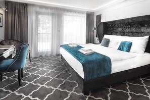 Superior tweepersoonskamer | Luxe beddengoed, Select Comfort-bedden, een minibar