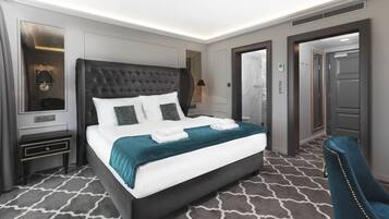 Superior tweepersoonskamer | Luxe beddengoed, Select Comfort-bedden, een minibar