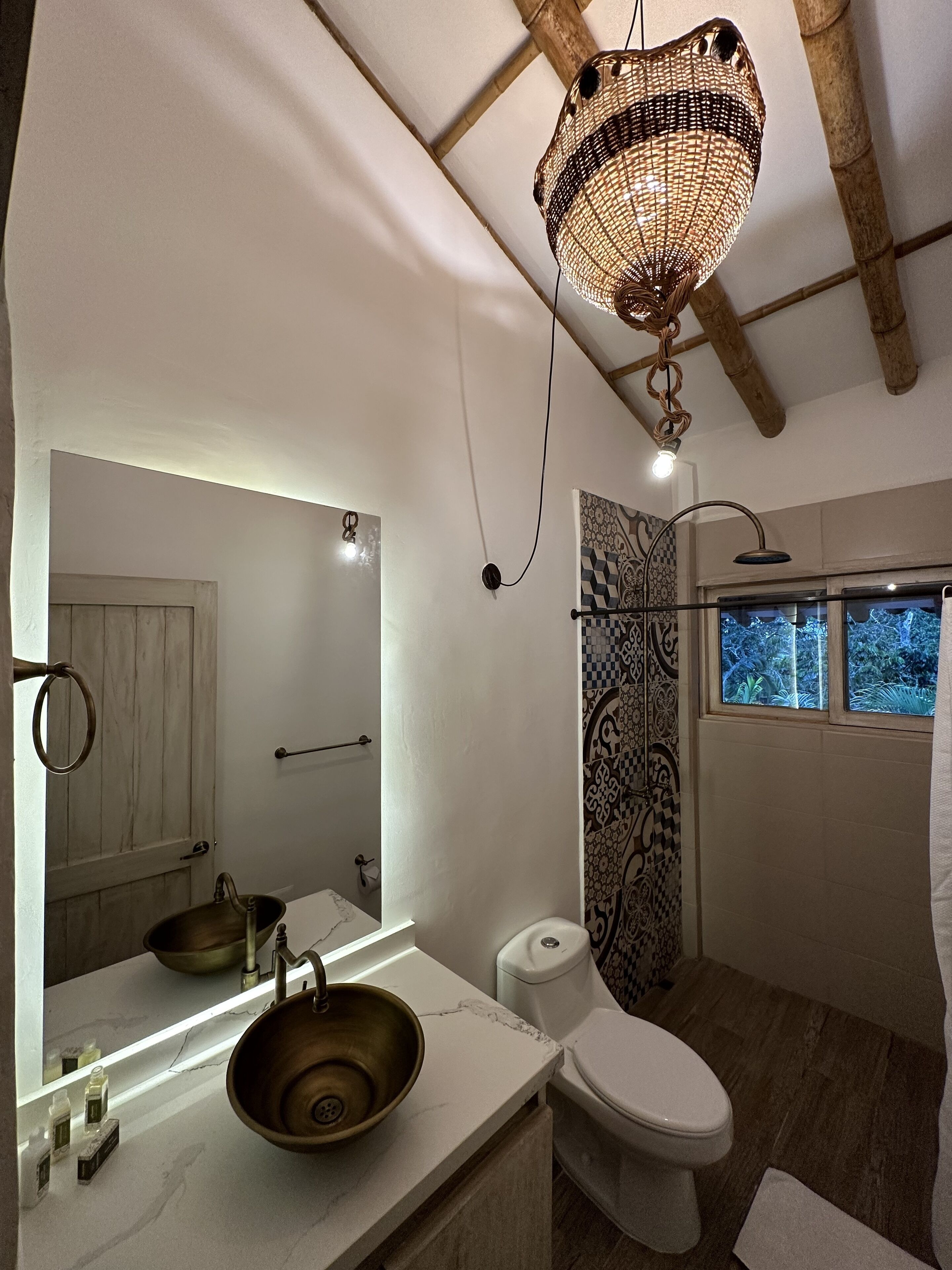 deluxe double room | bathroom | shower, rainfall showerhead, towels