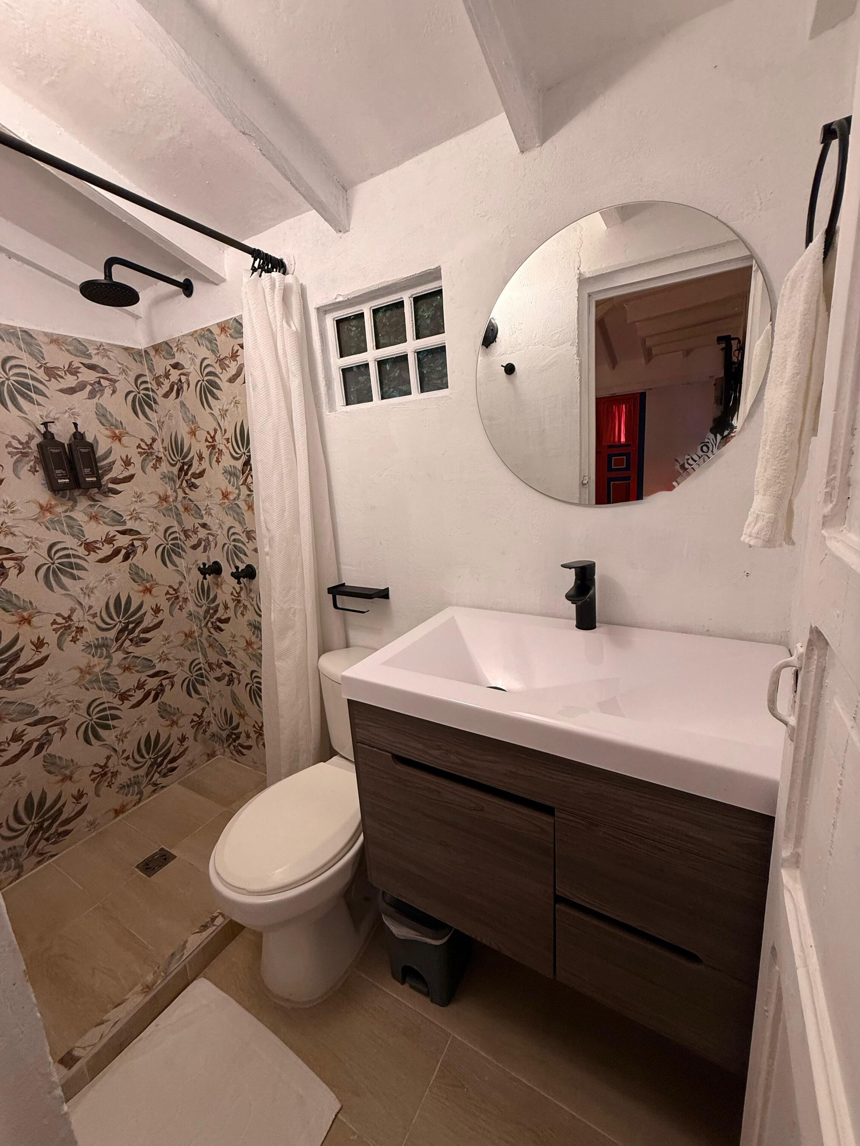 traditional quadruple room | bathroom | shower, rainfall showerhead, towels