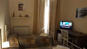 Comfort Room, Ensuite | Individually decorated, individually furnished, desk, iron/ironing board