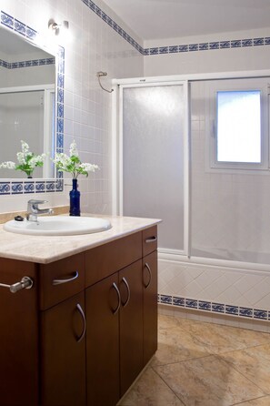 Bathtub, hair dryer, towels