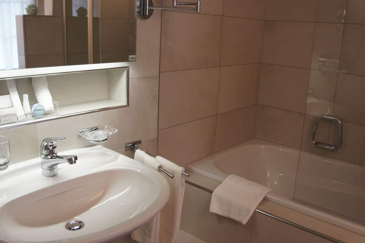 free toiletries, hair dryer, slippers, towels