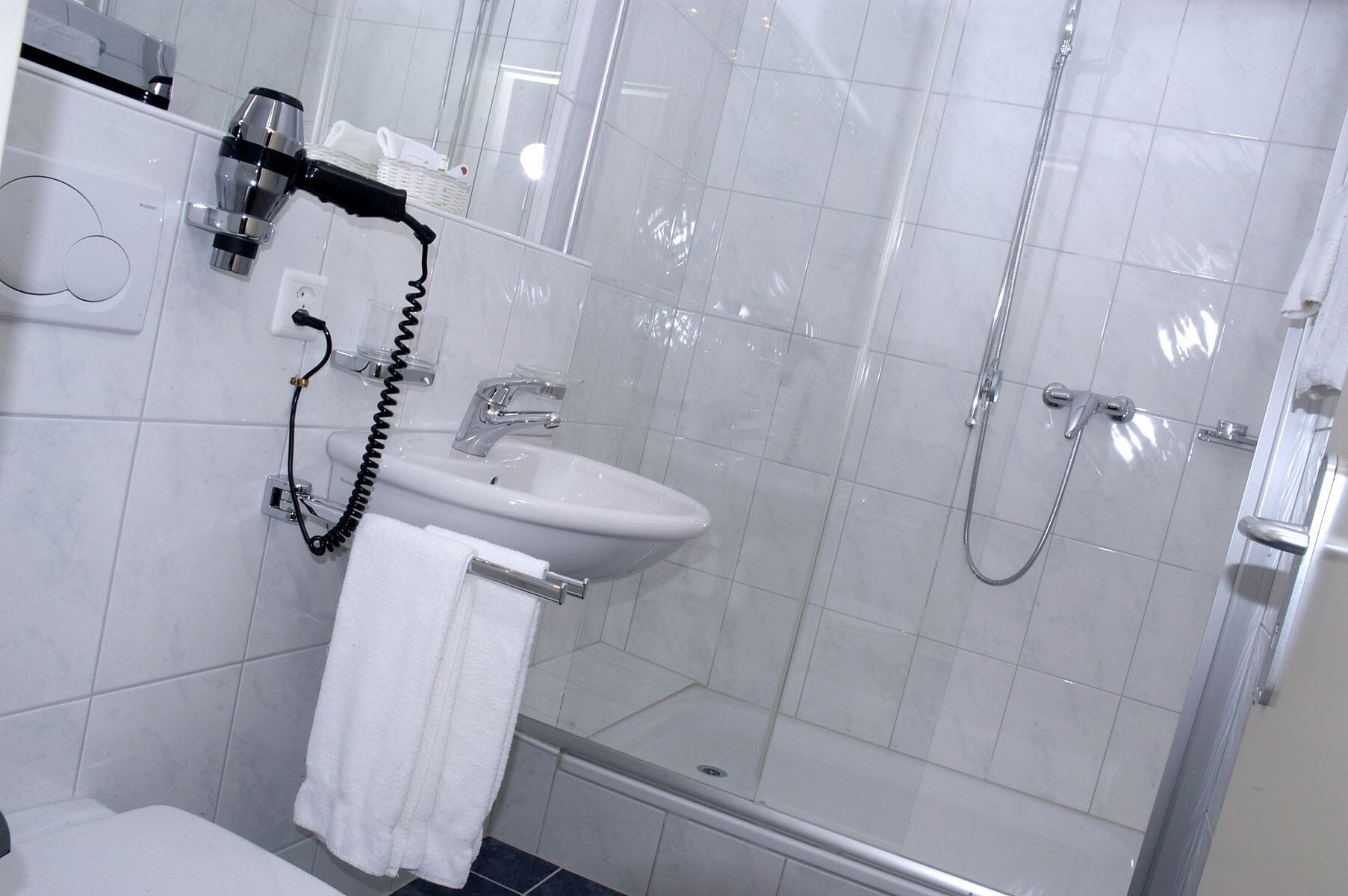 free toiletries, hair dryer, slippers, towels