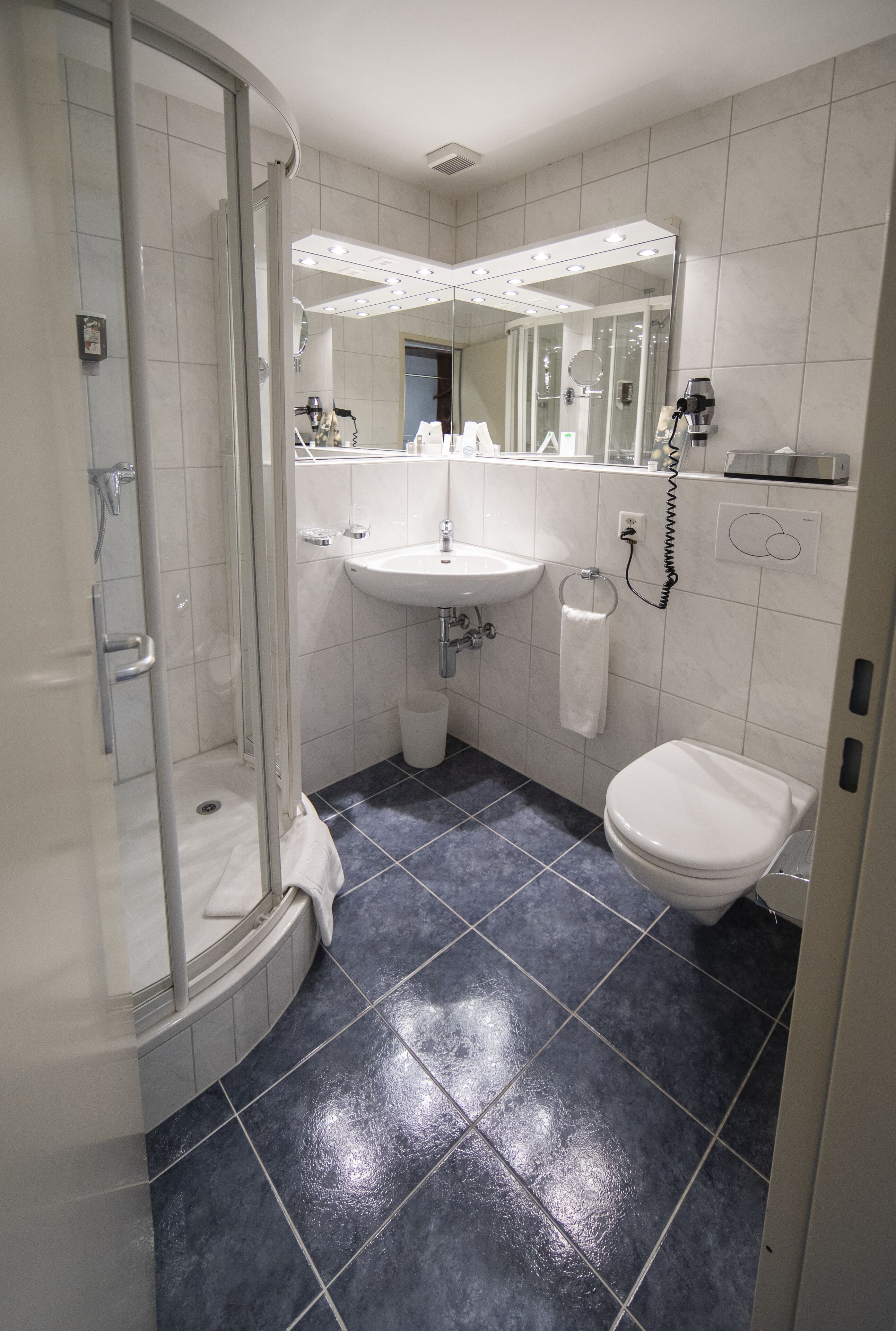 free toiletries, hair dryer, slippers, towels