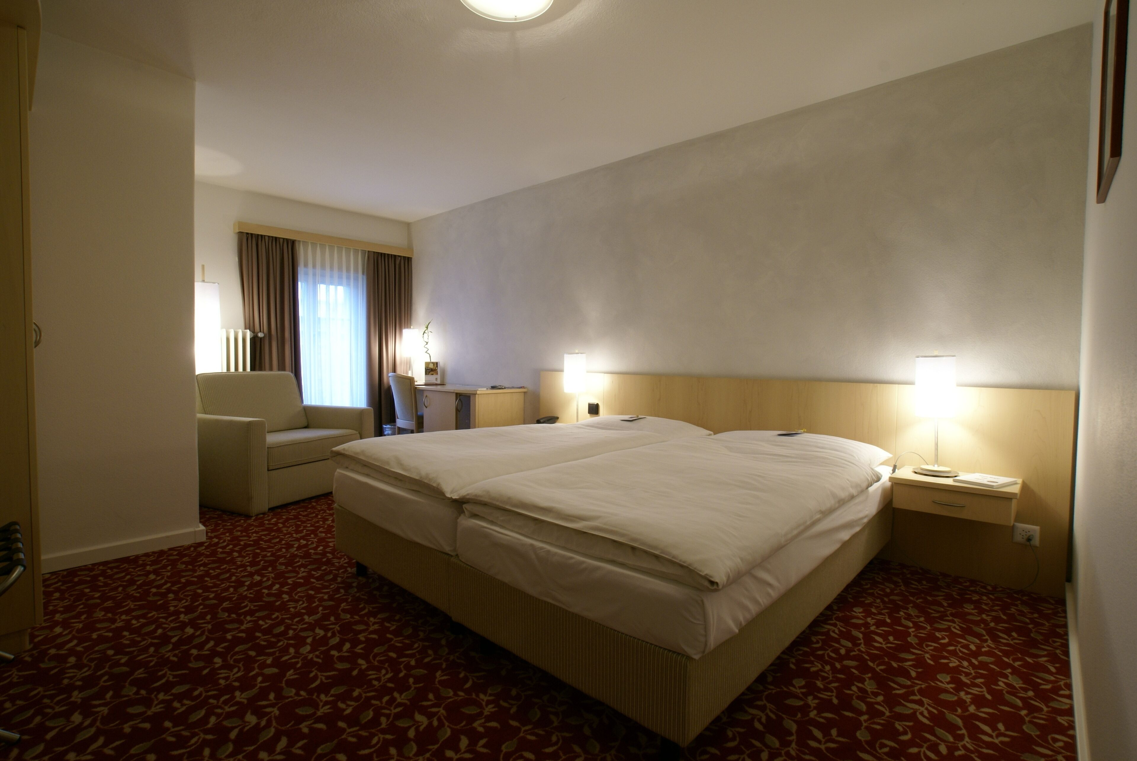 hypo-allergenic bedding, down duvets, free minibar