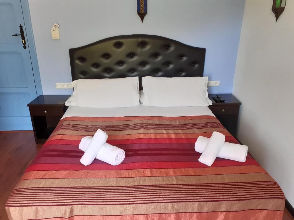 blackout curtains, iron/ironing board, free wifi, bed sheets