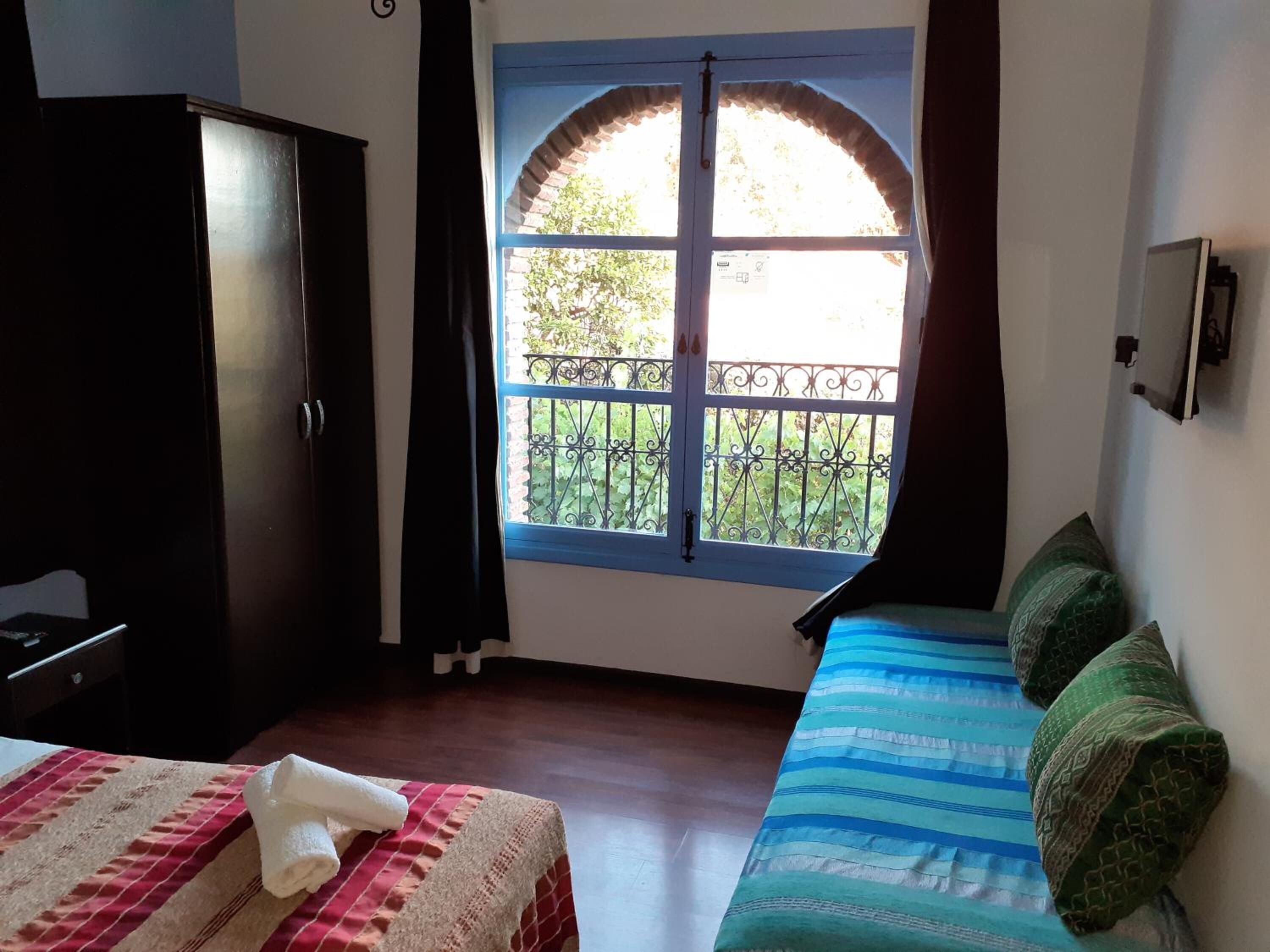 blackout curtains, iron/ironing board, free wifi, bed sheets