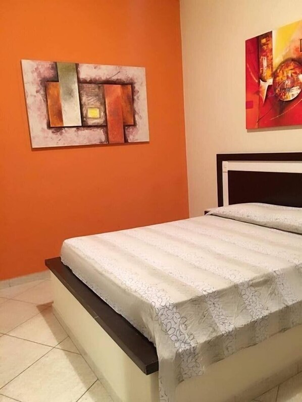 อพาร์ทเมนท์, เตียงใหญ่ 1 เตียง | เตารีด/โต๊ะรีดผ้า, Wi-Fi ฟรี, ผ้าปูที่นอน