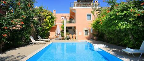 Outdoor pool, pool umbrellas, pool loungers