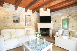 Grand Villa, Multiple Bedrooms, Private Pool | Living room | LCD TV, fireplace, DVD player - Villa Pasiphae (Faistos)