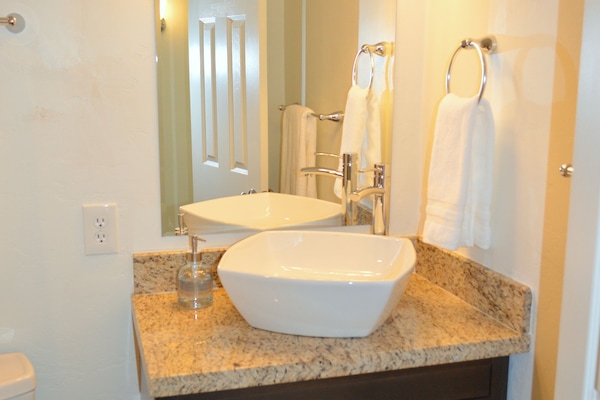 Hair dryer, towels, soap, shampoo