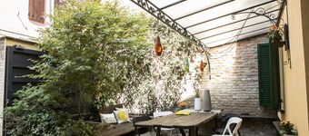 House in the center with parking