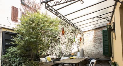 House in the center with parking