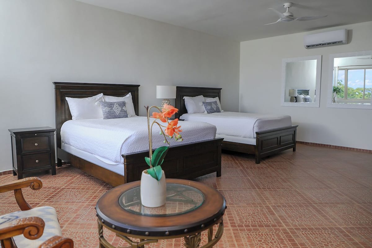 Quadruple Room, 2 Queen Beds, Non Smoking, Beach View | In-room safe, soundproofing, iron/ironing board, free WiFi