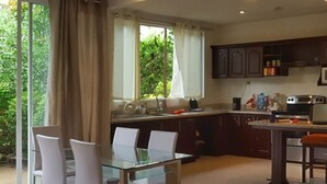 Family Apartment, 2 Bedrooms, Non Smoking, Hill View | Private kitchen | Full-size fridge, microwave, oven, stovetop - La Meridiana - Luxury Condos (Tamarindo)