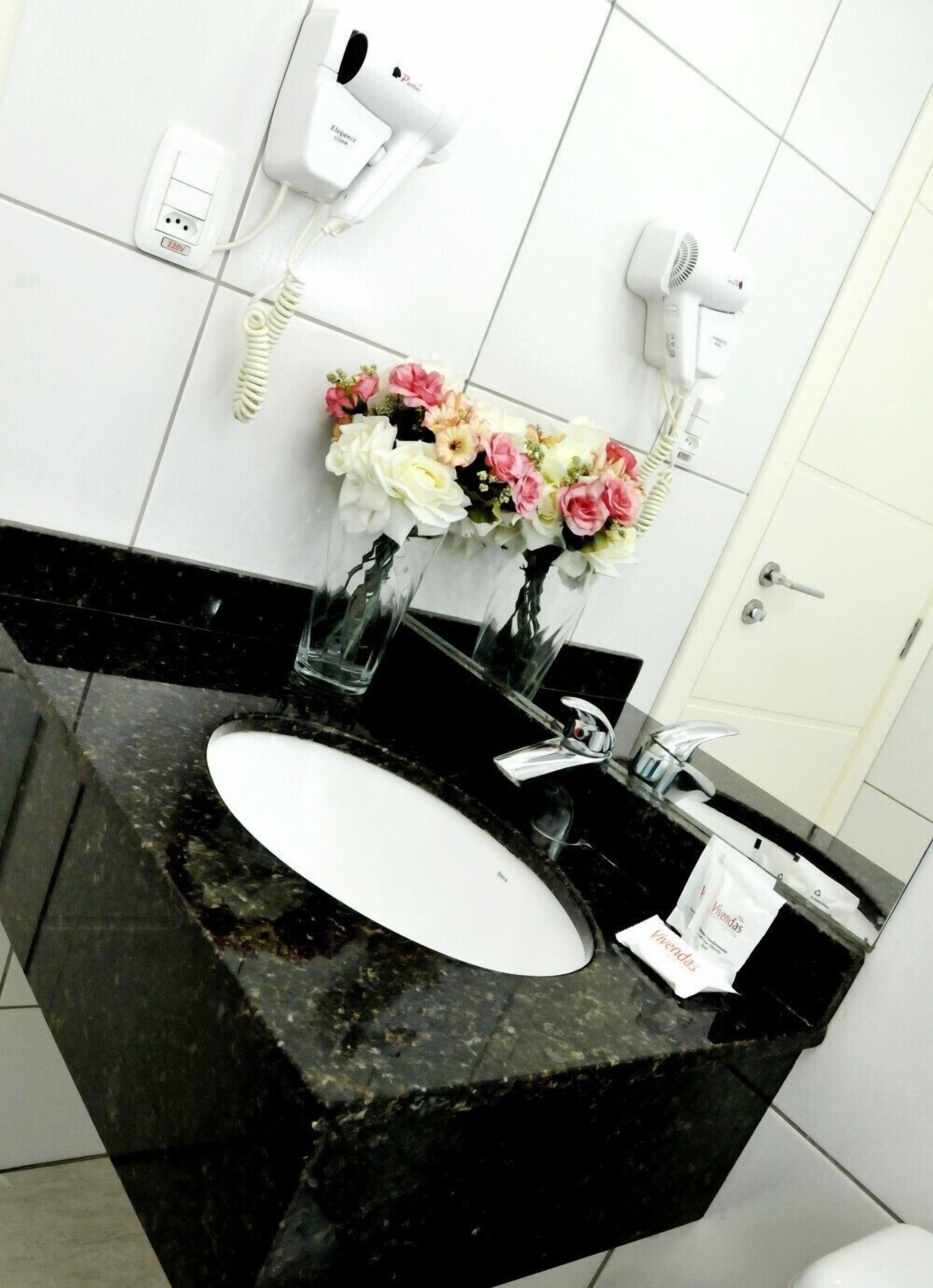 deluxe room, multiple beds, non smoking | bathroom sink