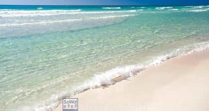 Relax by Gulf waves/corner unit/deeded beach access
