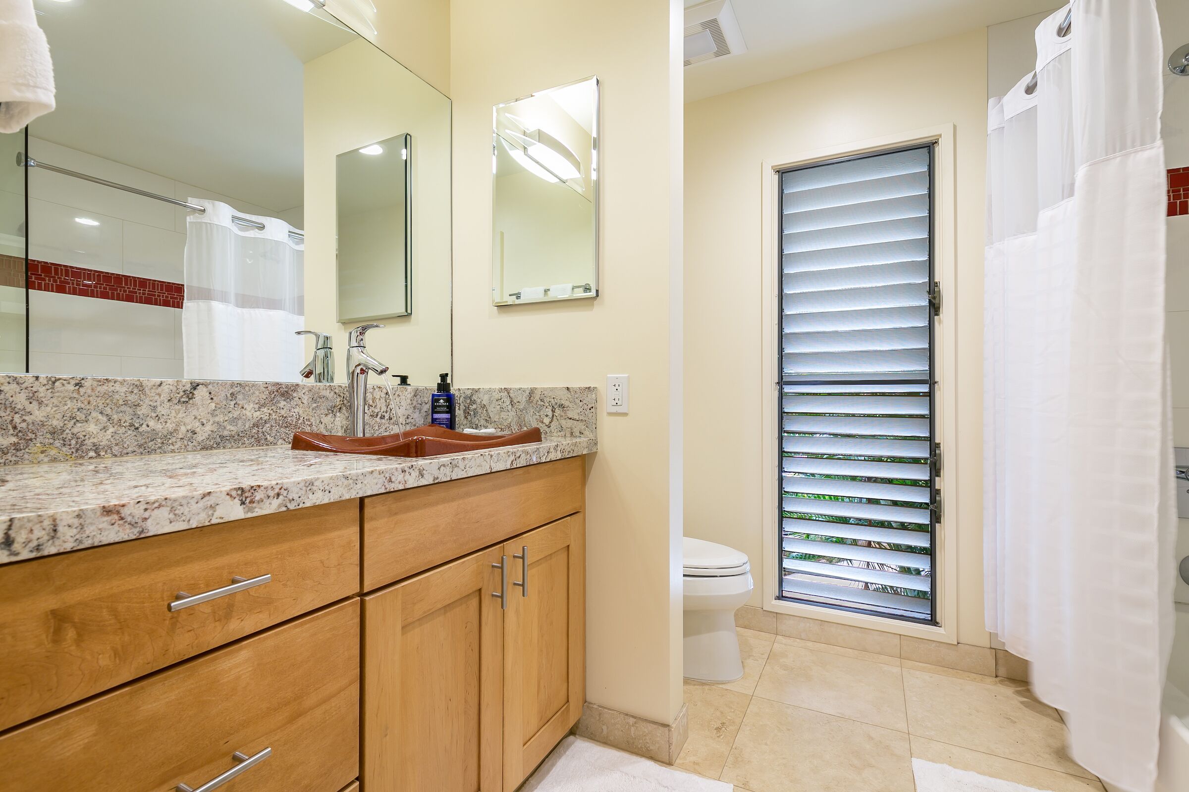 Combined shower/tub, hair dryer, towels, soap