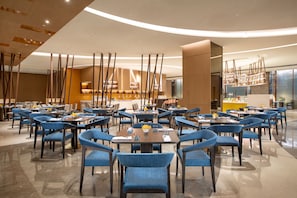 3 restaurants, breakfast, lunch, dinner served; Fusion cuisine