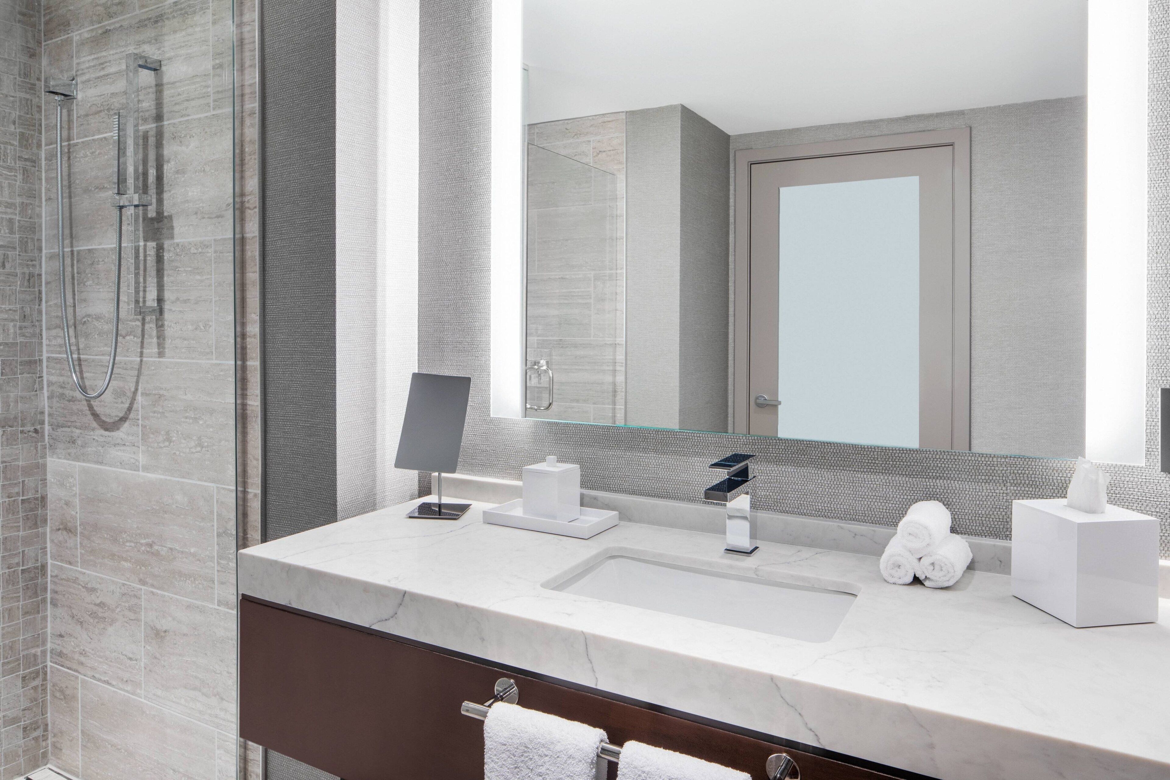 hydromassage showerhead, free toiletries, hair dryer, towels