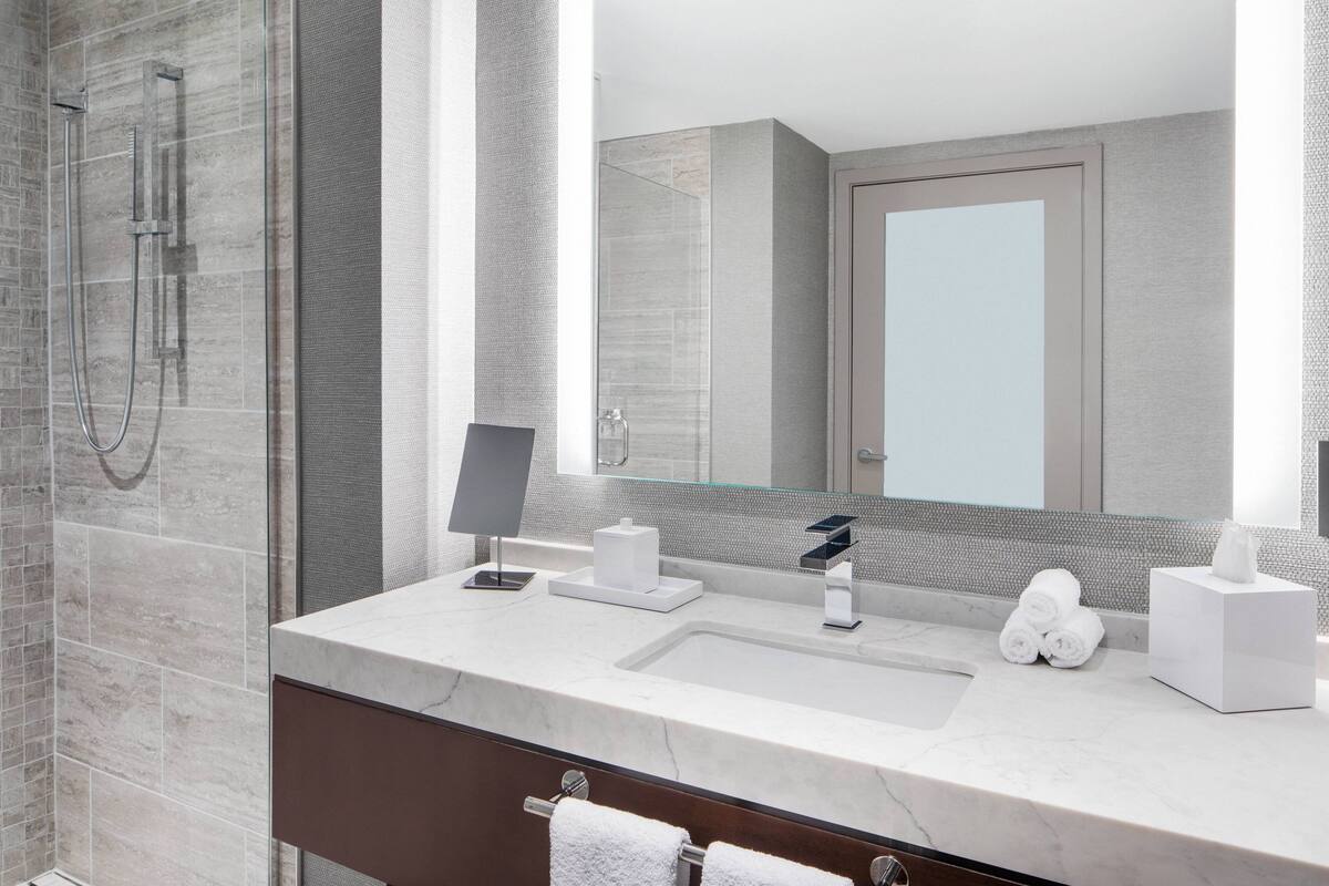 hydromassage showerhead, free toiletries, hair dryer, towels