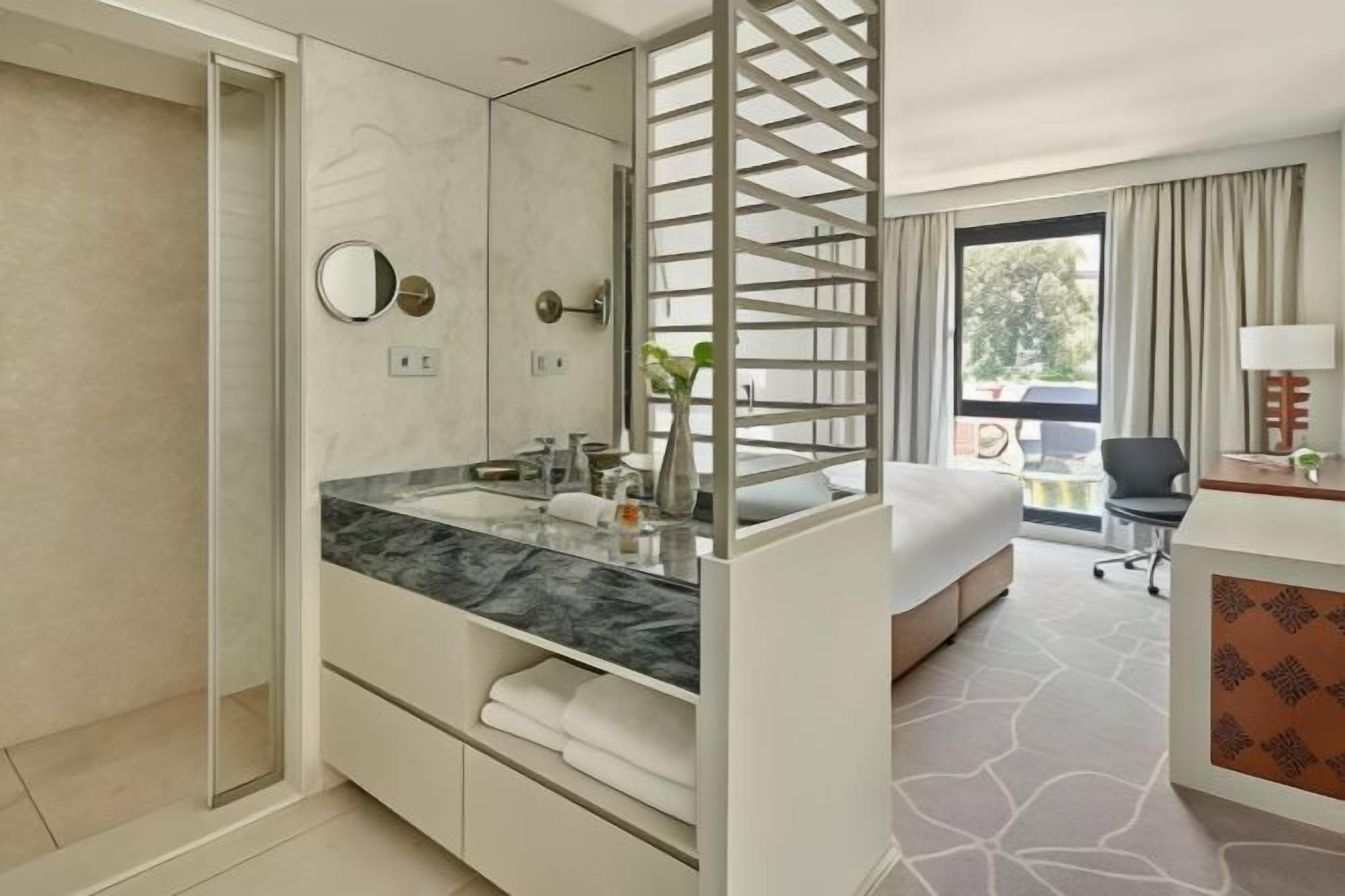 Hypo-allergenic bedding, free minibar, in-room safe, desk