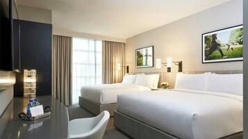 Premium bedding, down comforters, pillowtop beds, in-room safe