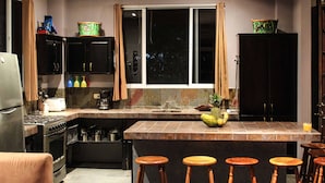 Luxury Condo, Multiple Beds, Non Smoking, Ocean View | Private kitchen | Coffee/tea maker, full-size fridge, microwave, oven