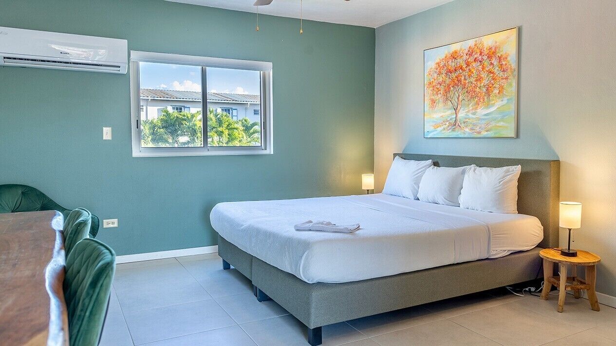 Premium bedding, Tempur-Pedic beds, desk, laptop workspace