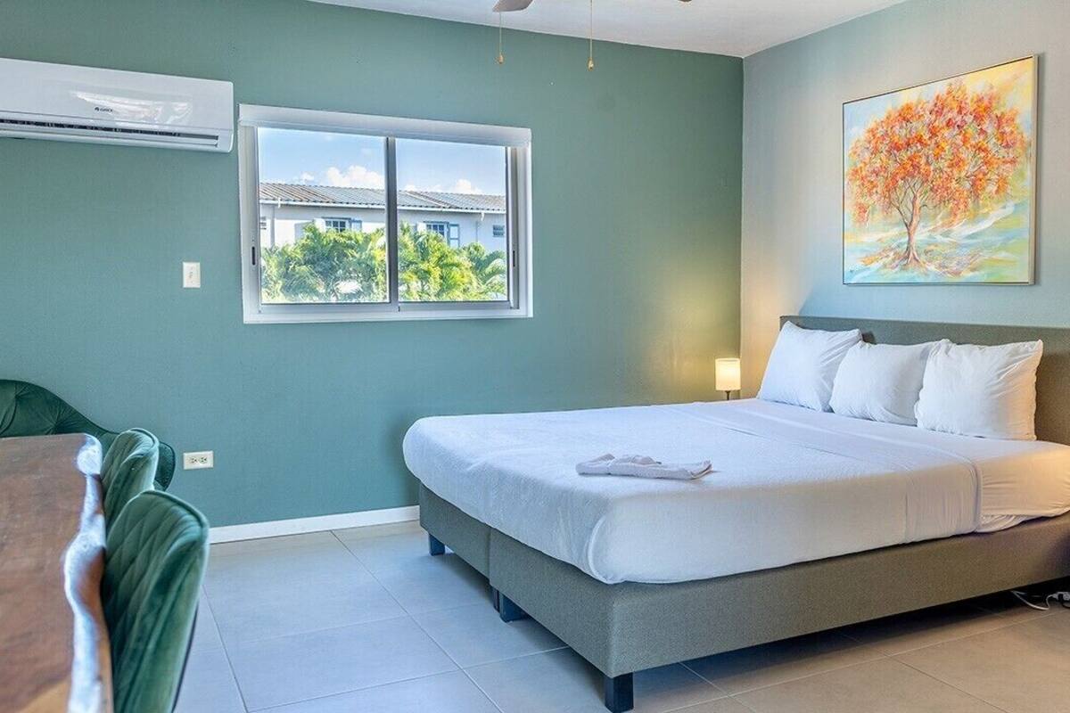 Premium bedding, Tempur-Pedic beds, desk, laptop workspace