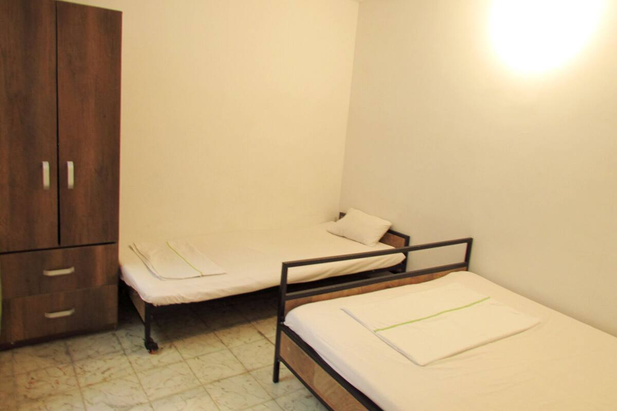 Standard Twin Room, 2 Twin Beds, Non Smoking, Shared Bathroom | Blackout drapes, WiFi (free), bed sheets