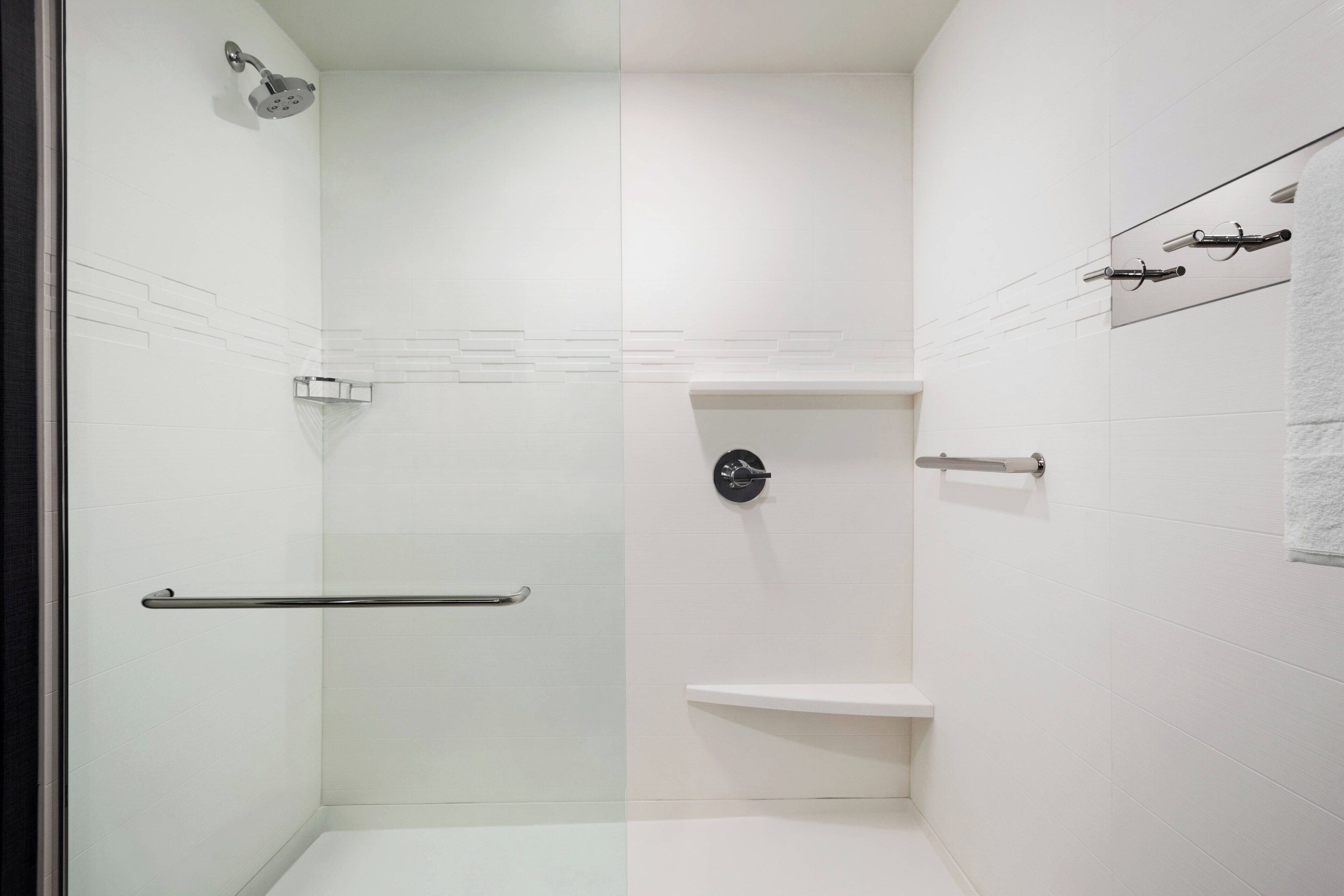 shower, designer toiletries, hair dryer, towels